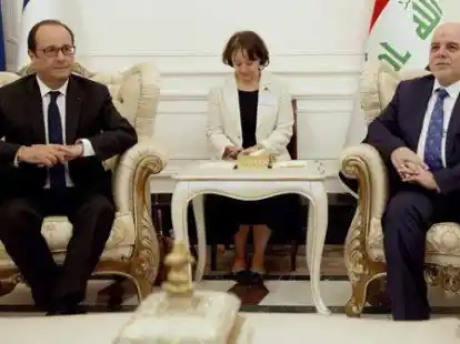 Iraks Regierungschef Haidar al-Abadi (R) und Frankreichs Pr&auml;sident Francois Hollande (L) in Baghdad.