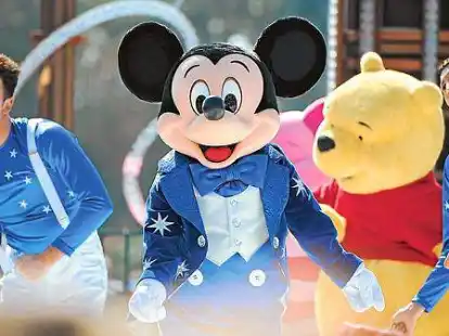 In Geburtstagsstimmung:  Micky Maus feiert mehrmals t&auml;glich mit seinen Freunden das 25-j&auml;hrige Bestehen.