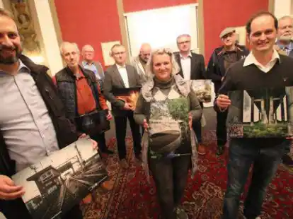 Haben mit ihren Motiven gewonnen: (von links) Eduard Peters, Tanja Haake und Bj&ouml;rn Kn&ouml;lke