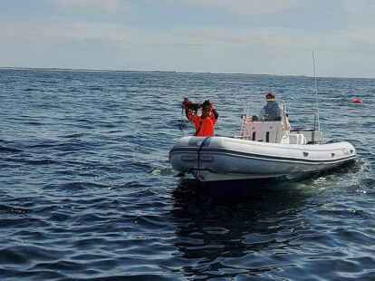 Die Tauchcrew freut sich &uuml;ber jedes geborgene Netz.
