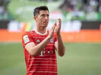Der wechselwillige St&uuml;rmerstar Robert Lewandowski wird am Dienstag zum Trainingsstart in M&uuml;nchen zur&uuml;ckerwartet. Foto: Swen Pf&ouml;rtner/dpa