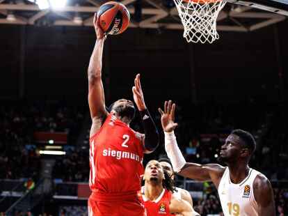 Corey Walden (l) und die Bayern gewannen ihr Heimspiel gegen Lyon-Villeurbanne.