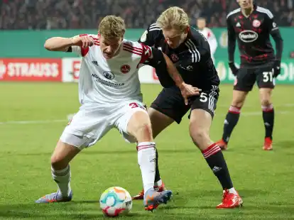 Christoph Daferner (l) setzte sich mit dem 1. FC N&uuml;rnberg gegen Christoph Klarer und Fortuna D&uuml;sseldorf durch.