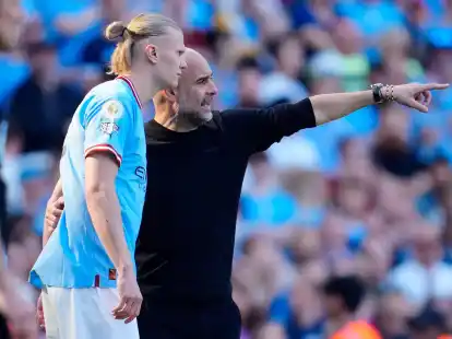 Starcoach und Torj&auml;ger:&nbsp;Pep Guardiola (r) und Haaland wollen mit Manchester City den K&ouml;nigsklassen-Pokal holen.