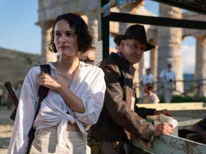 Phoebe Waller-Bridge (l) als Helena und Harrison Ford als Indiana Jones in einer Szene des Films &laquo;Indiana Jones und das Rad des Schicksals&raquo;.