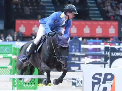 Springreiter Christian Ahlmann setzte sich in Paris durch.