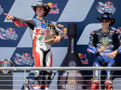 Alex Rins (l) holte sich beim Grand Prix der USA den Sieg.