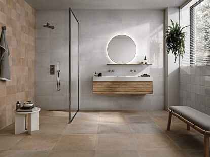 Wenn man Badboden und Dusche durchg&auml;ngig fliest, wirkt der Raum gro&szlig;z&uuml;gig, der Duschzugang ist barrierefrei, und die Reinigung f&auml;llt auch leichter.