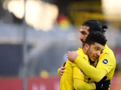 Emre Can (r) w&uuml;nscht sich eine R&uuml;ckkehr von Jadon Sancho zum BVB.