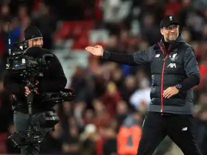 H&ouml;rt nach knapp neun Jahren als Cheftrainer an der Anfield Road auf: J&uuml;rgen Klopp (r).