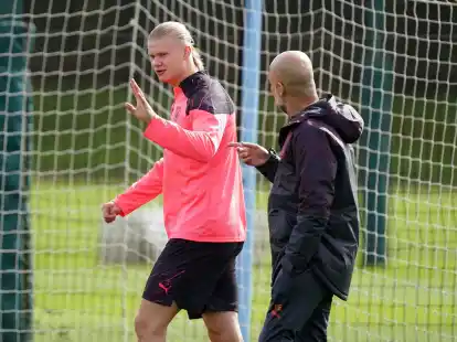 Erling Haaland (l) wird Manchester City weiter fehlen.