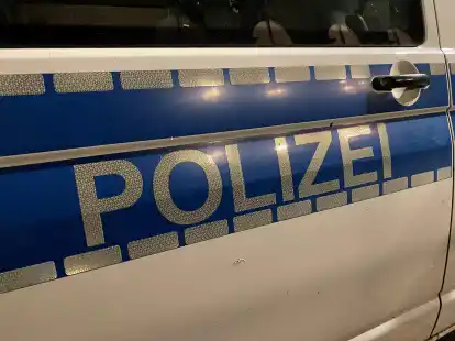 Schriftzug an einem Polizeiwagen