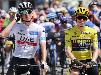Tadej Pogacar (l) ist der gro&szlig;e Favorit f&uuml;r die Tour de France. Ob Titelverteidiger Jonas Vingegaard (r) bei der Frankreich-Rundfahrt am Start ist, steht noch nicht fest.