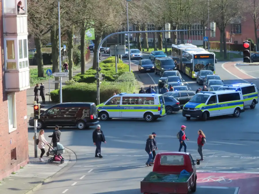 On the major police operation: Police stop a vehicle at an intersection - ...