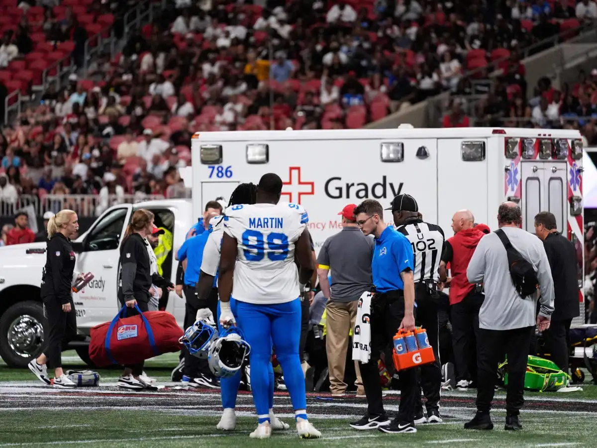 Morice Norris being transported from the field